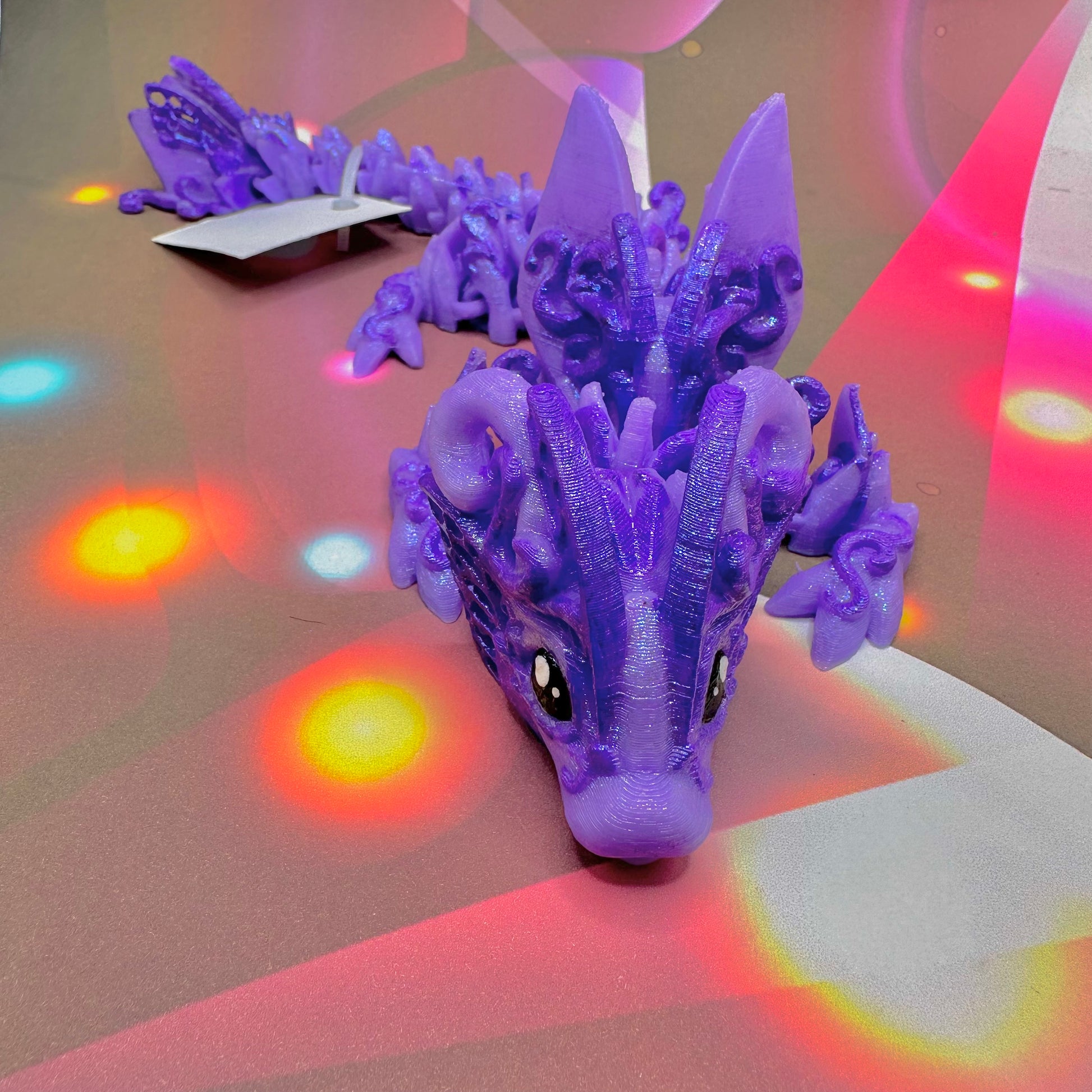 This Purple Butterfly Dragon can be your fab new fidget companion from Tales and Scales Shoppe at More Heart Studio! 