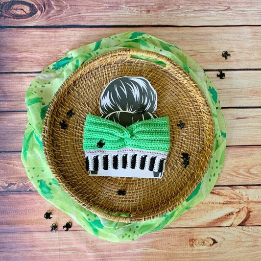 Beetlejuice Inspired Crochet Ear Warmer made by the Salty Stitchers.